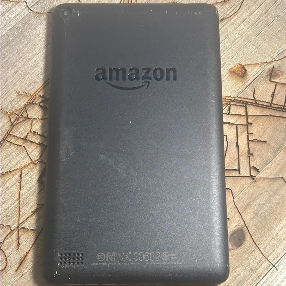 Amazon 7 5th Gen Black Tablet with Sleek Design and Vibrant Display with cover.